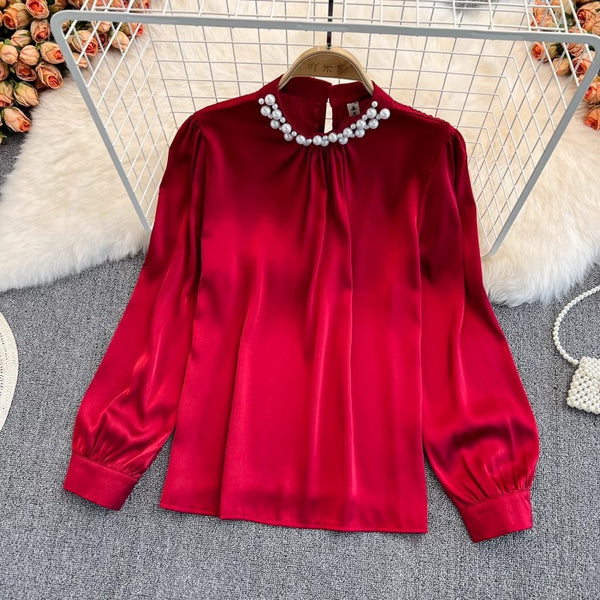 Bluza Yanna rosie cu decolteu accesorizat cu perle